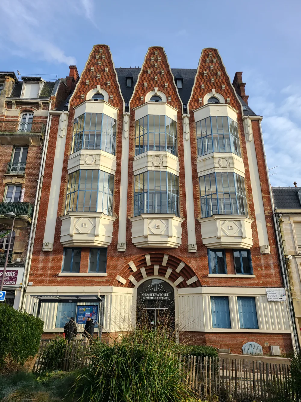 Conservatoire de musique Art Deco brick facade from the 1920s reconstruction of Saint-Quentin