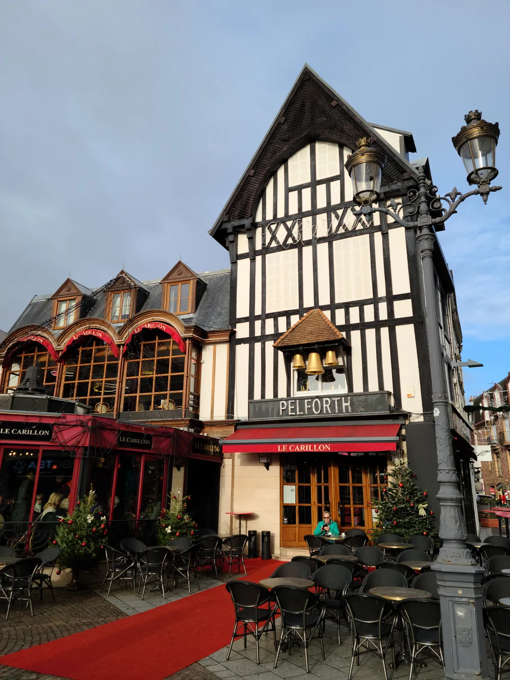 Le Carillon Art Deco cinema and cafe in a half-timbered building in Saint-Quentin town center
